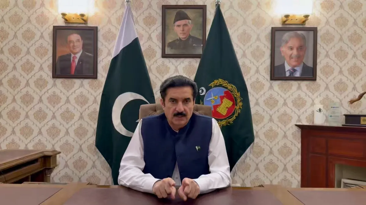 KP Governor Faisal Karim Kundi addresses the people of the province from his office, flanked by flags