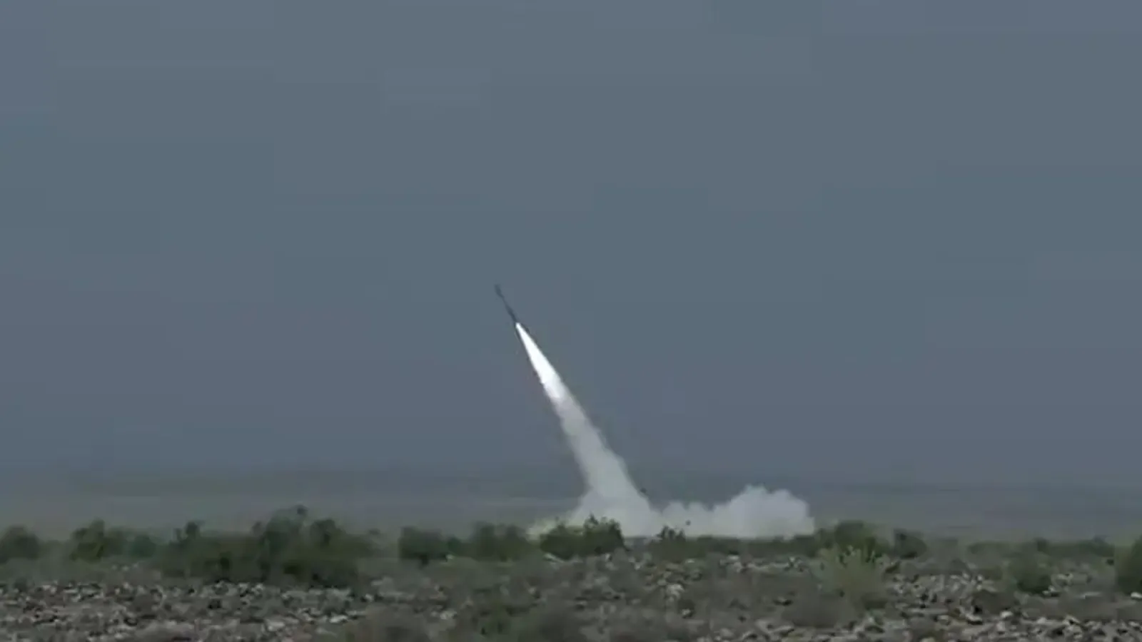 A Fatah-2 ER hypersonic missile lifts off from its launch site, trailing white smoke