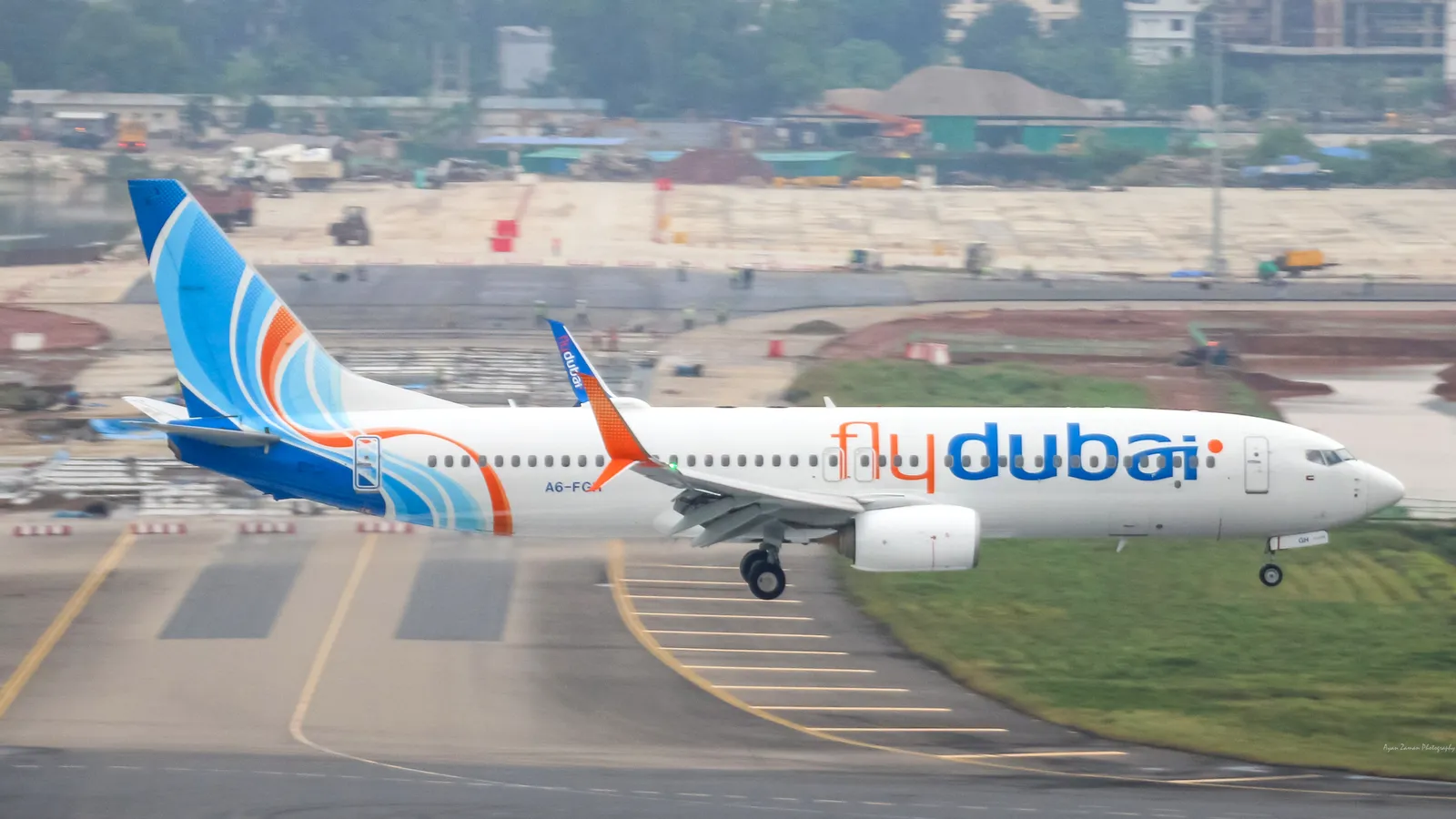 A flydubai Boeing 737 aircraft taxiing on a runway