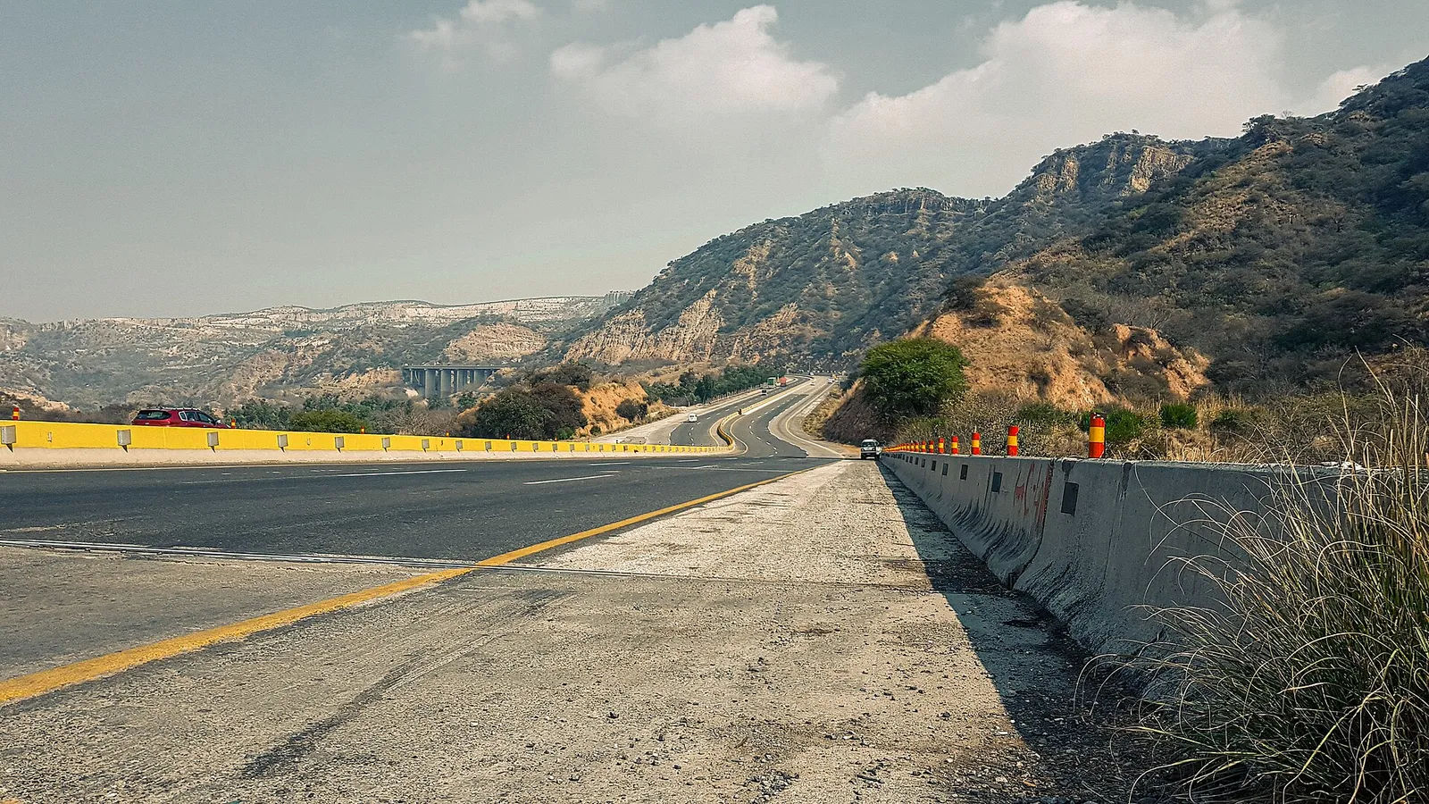 A motorway winding through hills in Pakistan