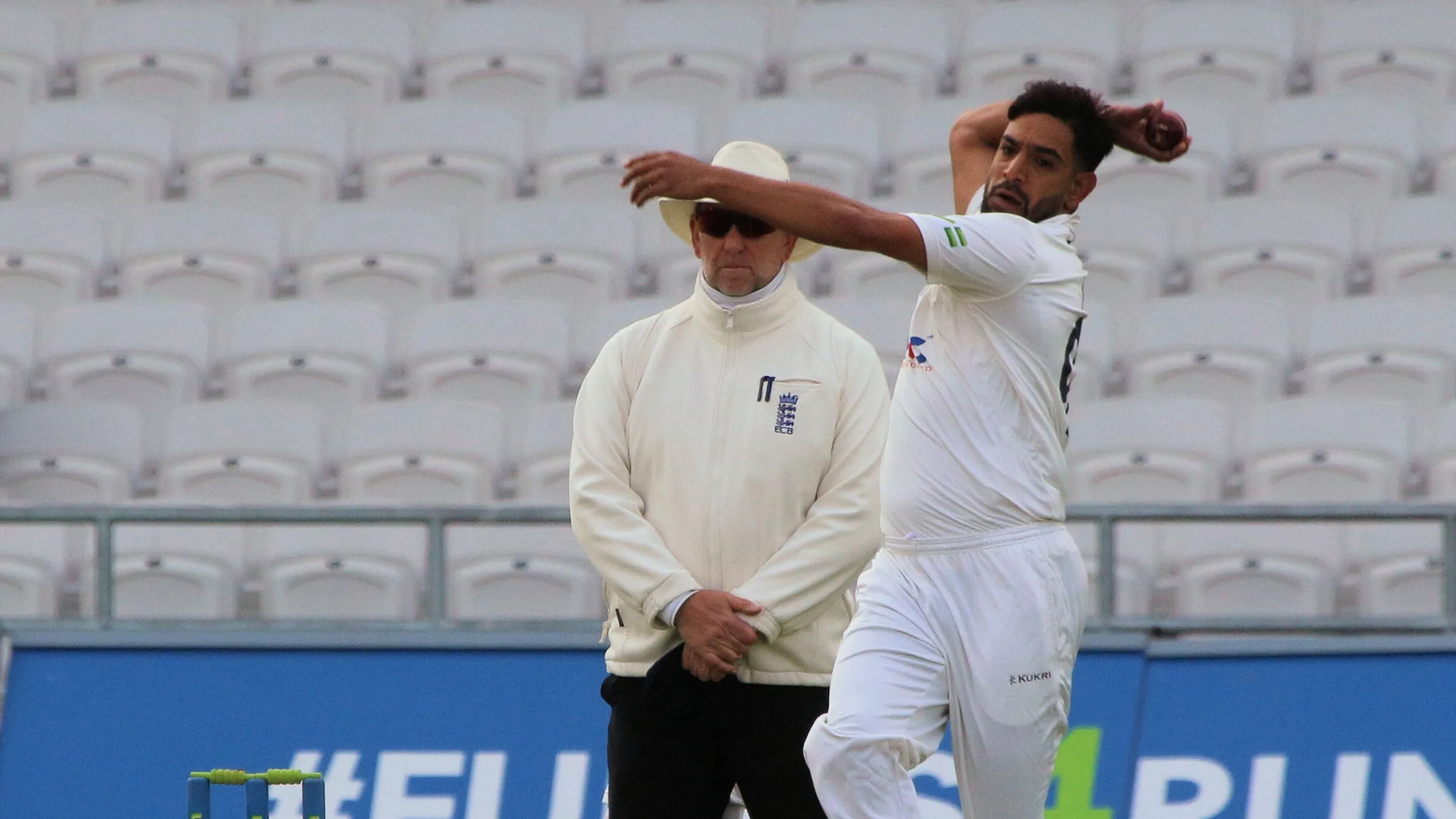Haris Rauf bowling in a red-ball match