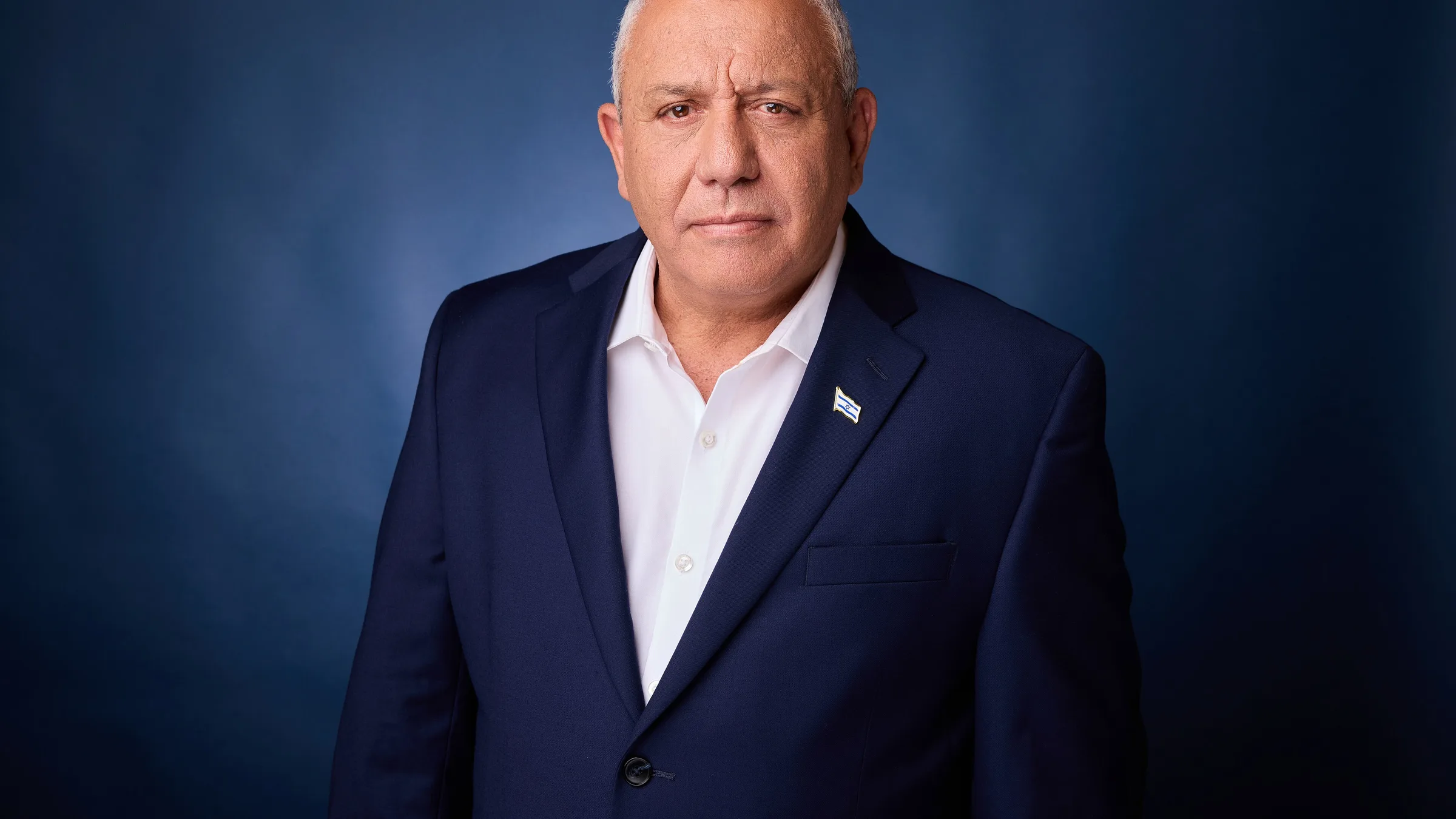 Gadi Eisenkot in a blue suit against a blue background