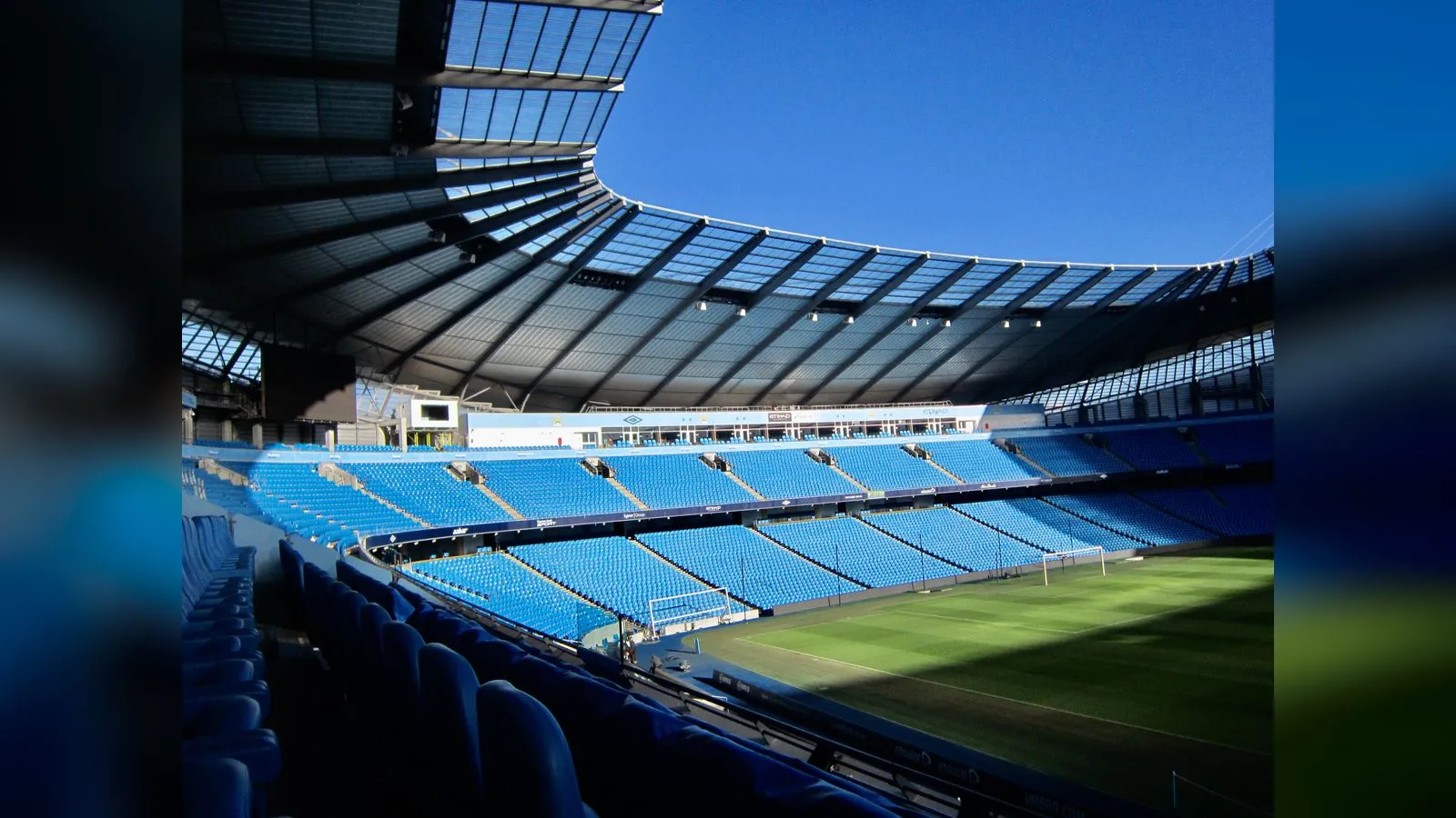 Empty blue seats inside the Etihad Stadium, home of Manchester City