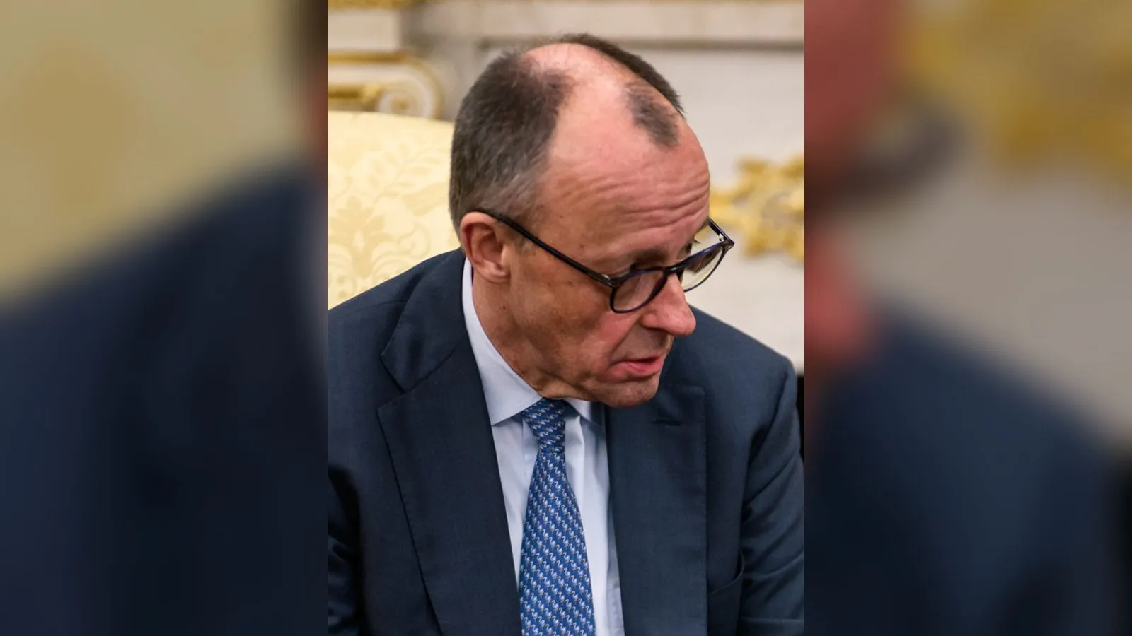 German Chancellor Friedrich Merz looking serious