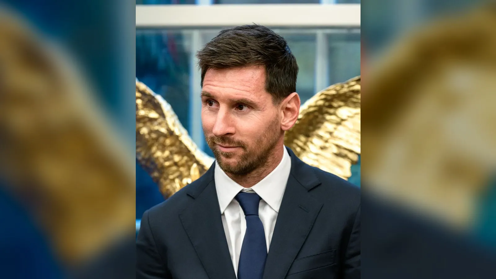 Lionel Messi in a suit at the White House