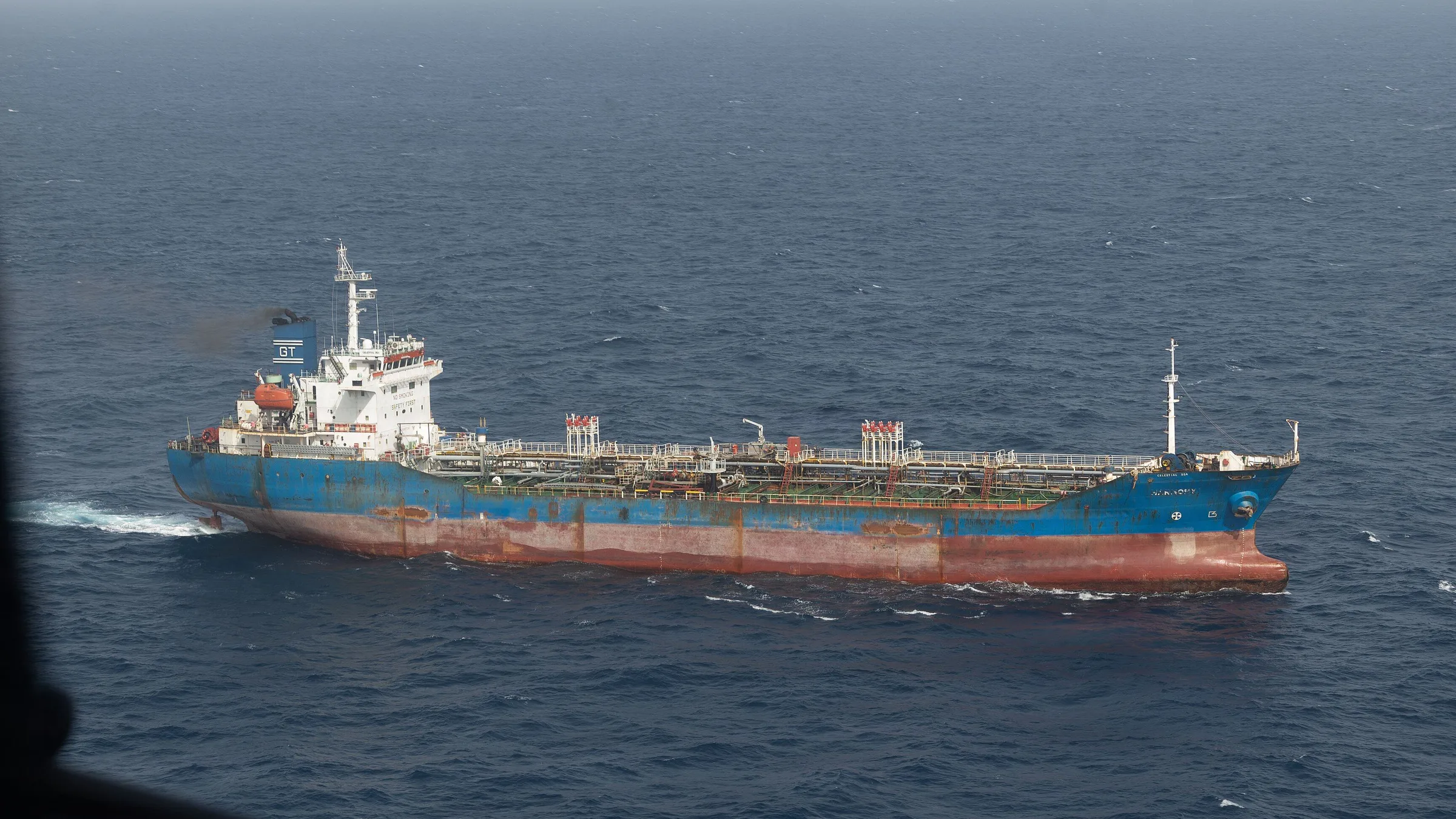 An oil tanker at sea seen from above