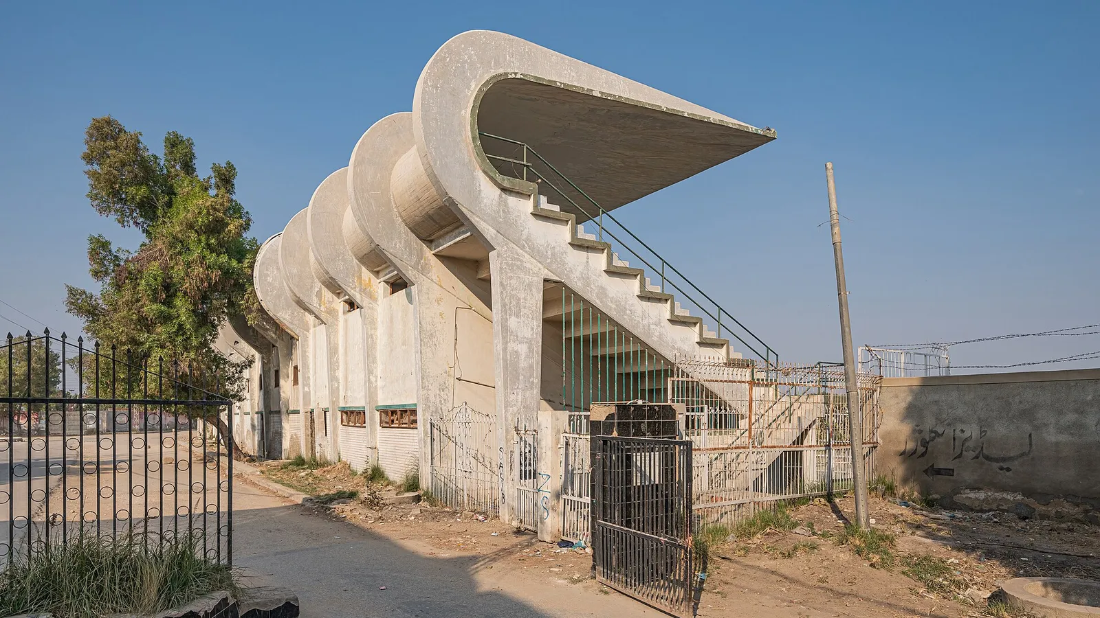 The curved concrete stands of Niaz Stadium in Hyderabad
