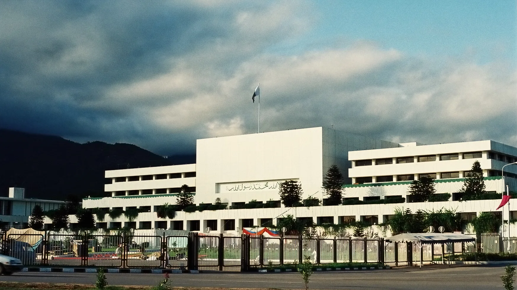 Parliament House in Islamabad under a cloudy sky