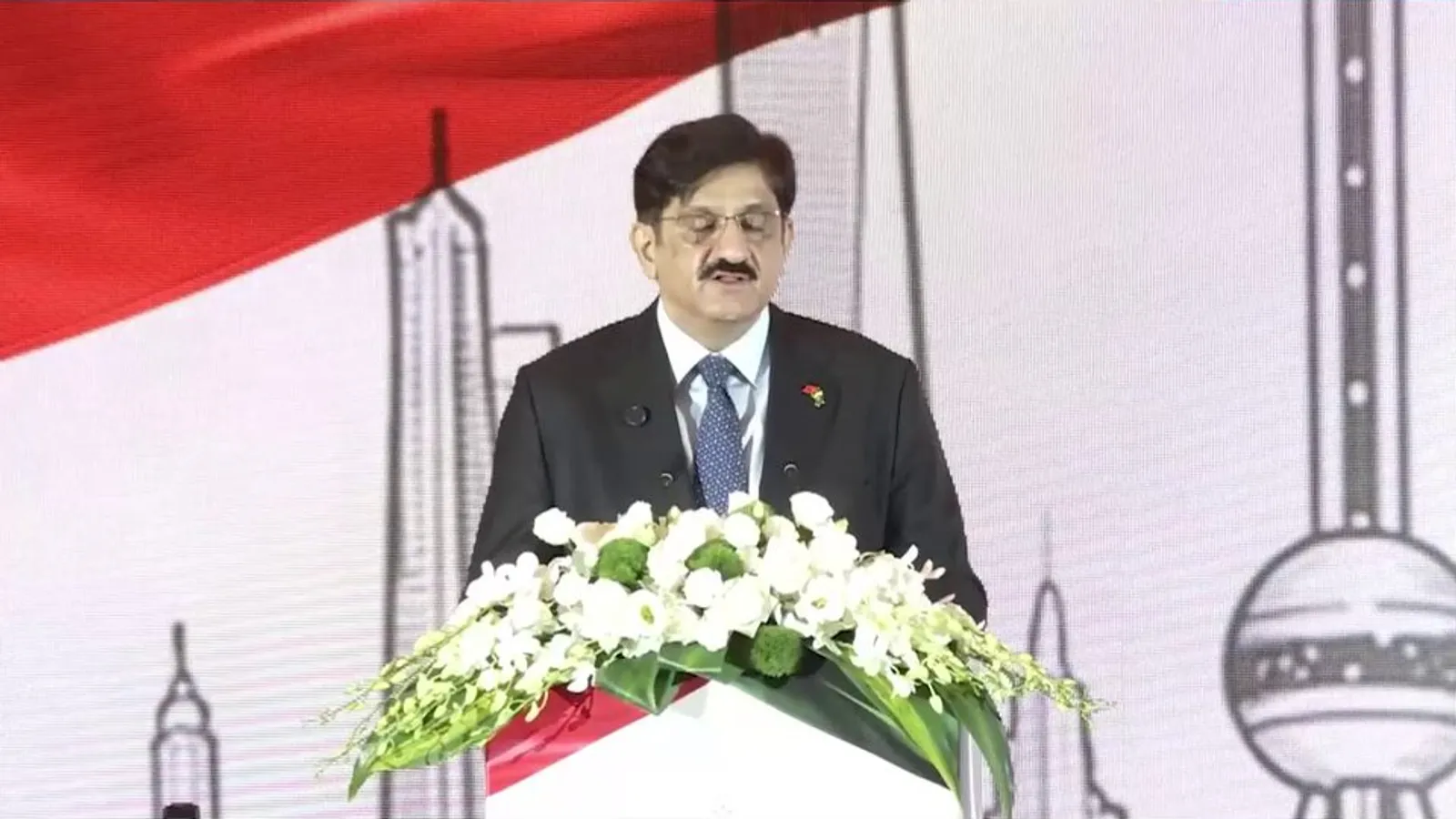 Sindh Chief Minister Murad Ali Shah speaking at a podium in Shanghai