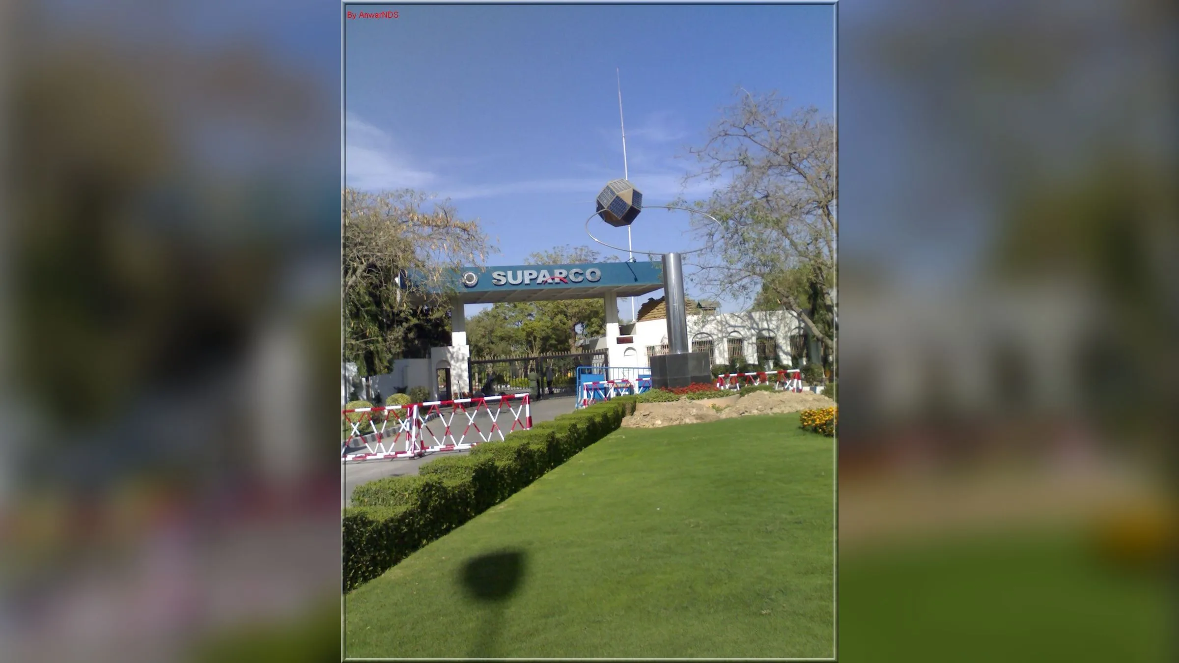 The entrance to SUPARCO's offices in Karachi with a globe sculpture on the lawn