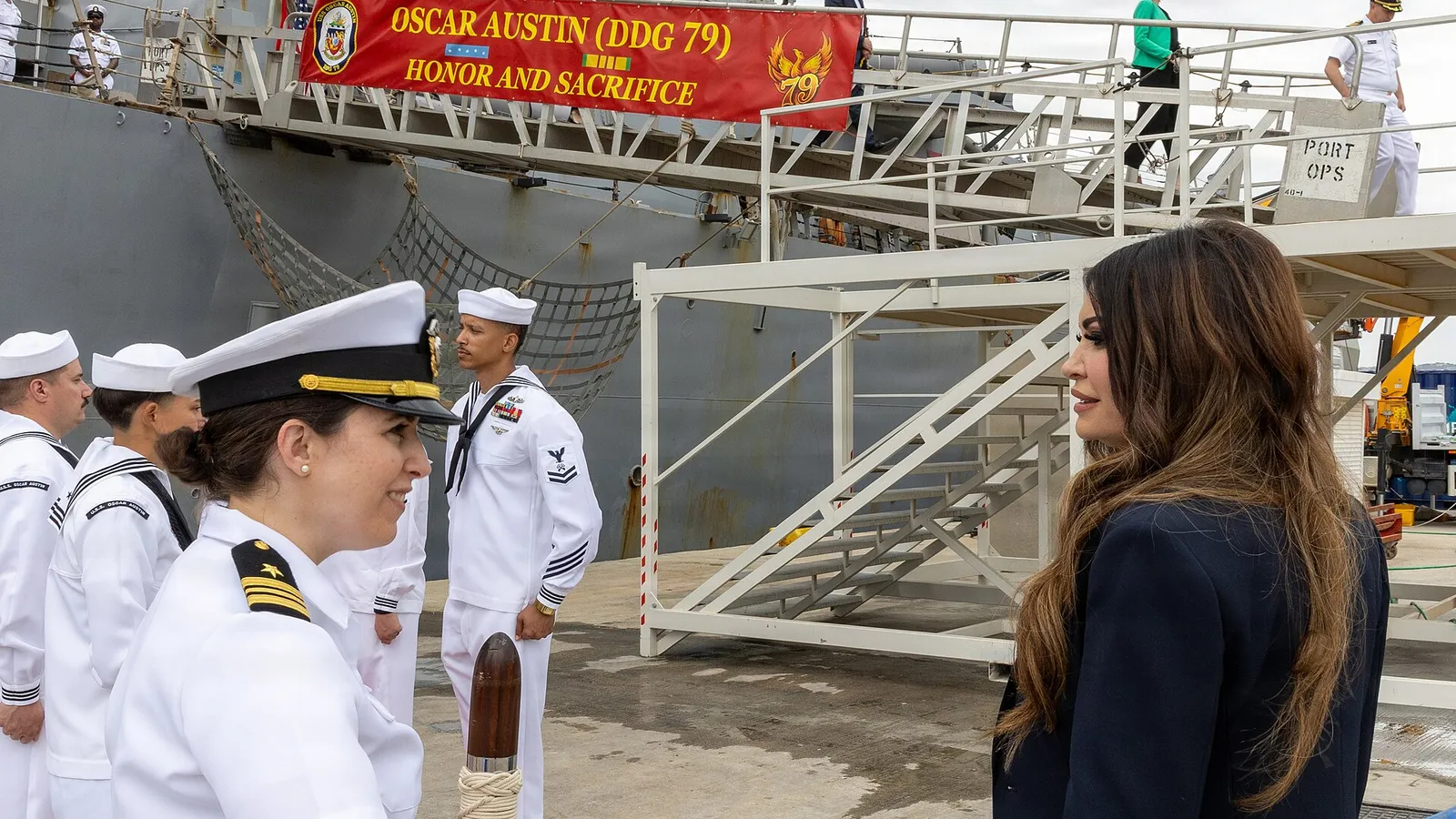 US Ambassador to Greece Kimberly Guilfoyle meets US Navy sailors beside a warship